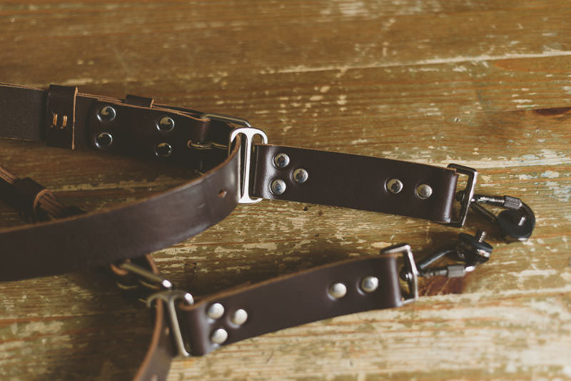 Dual leather camera straps for wedding photographers carrying two cameras