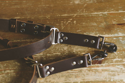 Dual leather camera straps for wedding photographers carrying two cameras