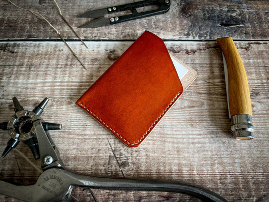 Handmade leather wallets and card holders in natural tan leather