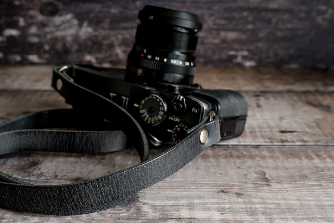 Handmade UK leather camera strap lifestyle shot