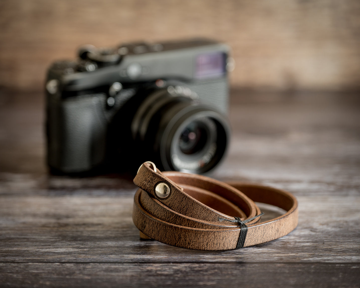 Thick durable antique brown veg tan leather camera strap for DSLR and film cameras