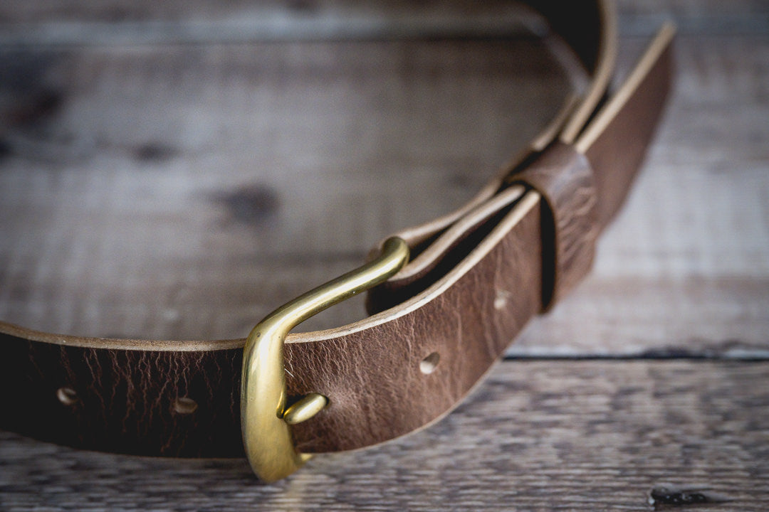 Handcrafted antique brown leather belt full length view with buckle holes