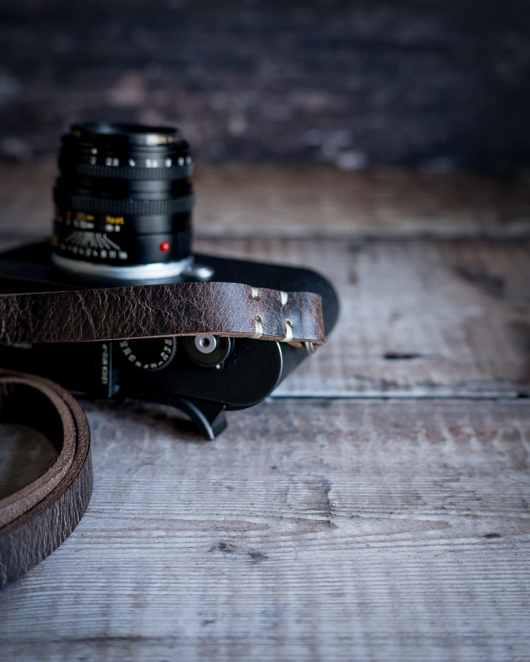 Savanna weathered leather camera strap attached to vintage camera handmade UK