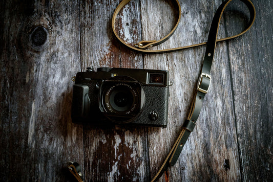 djustable Horween Chromexcel leather strap attached to mirrorless camera