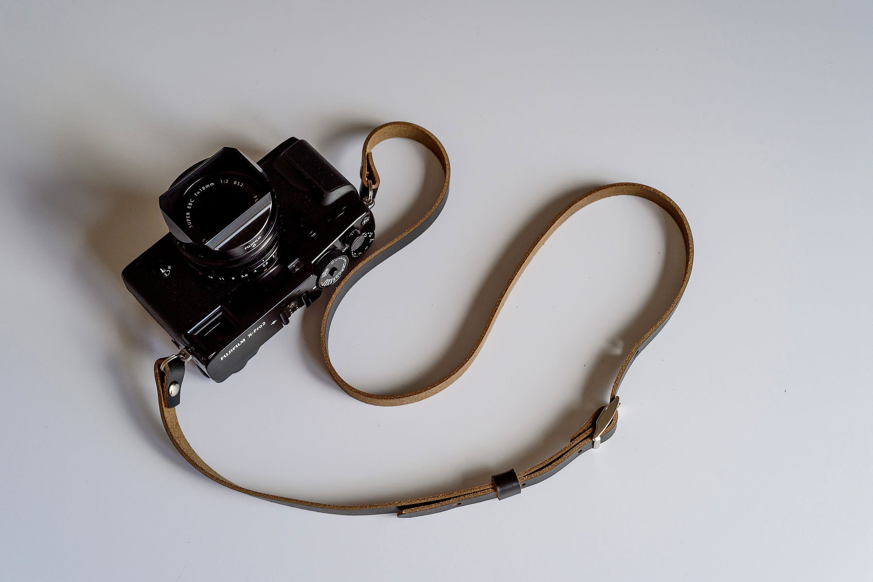 Premium Horween Chromexcel leather grain detail on adjustable camera strap