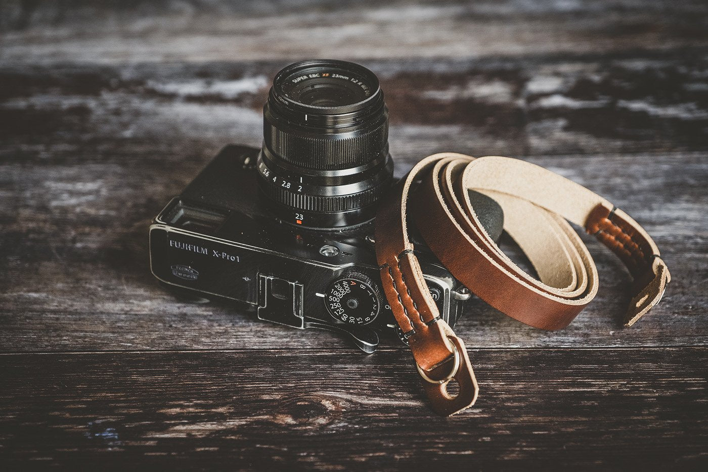 Premium minimal leather camera neck strap with protective bumpers handmade in UK