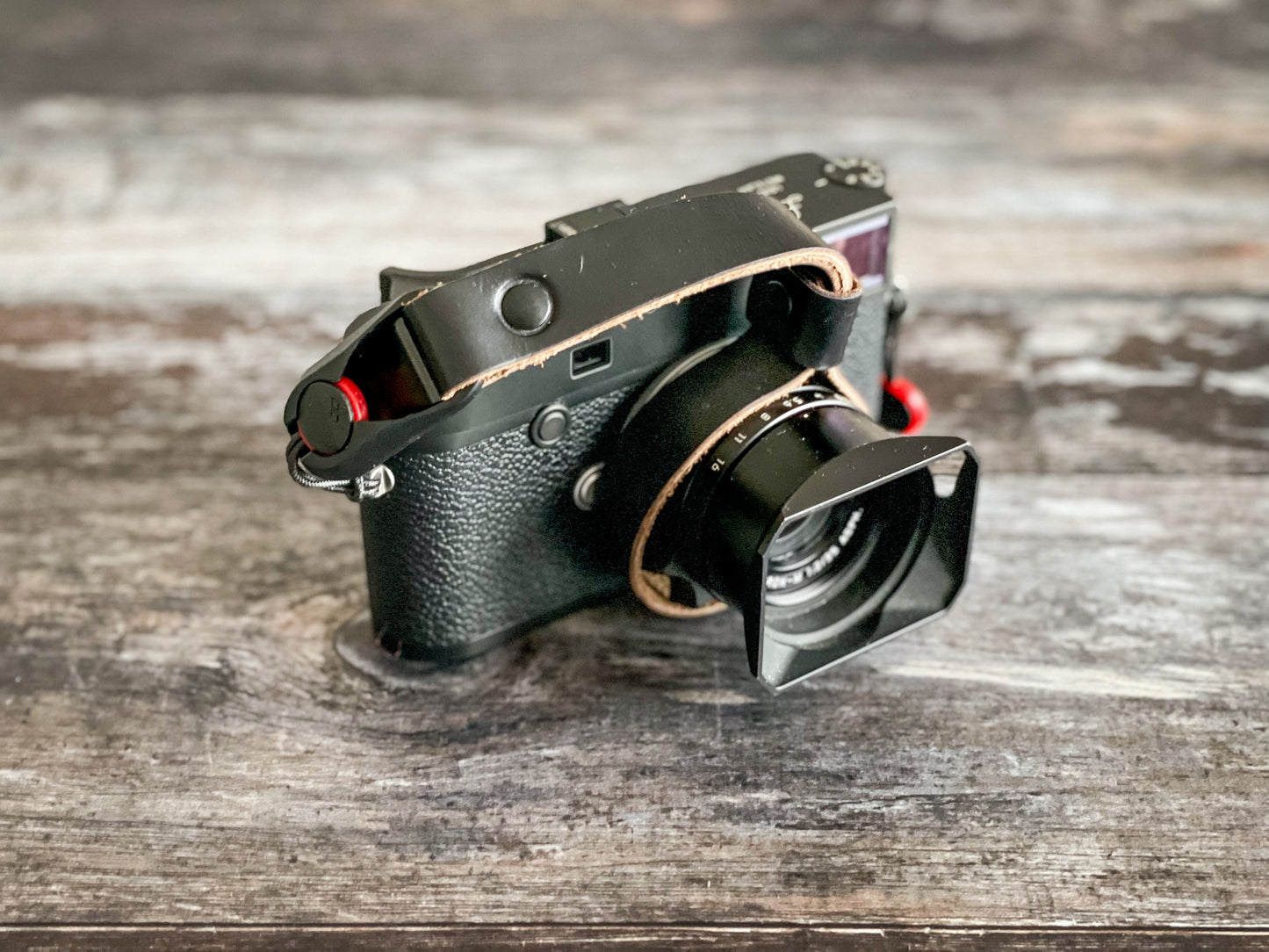 Premium Horween Chromexcel leather grain detail on camera wrist strap