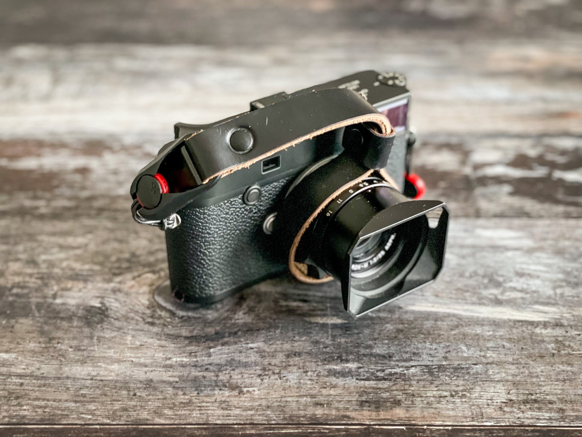 Premium Horween Chromexcel leather grain detail on camera wrist strap